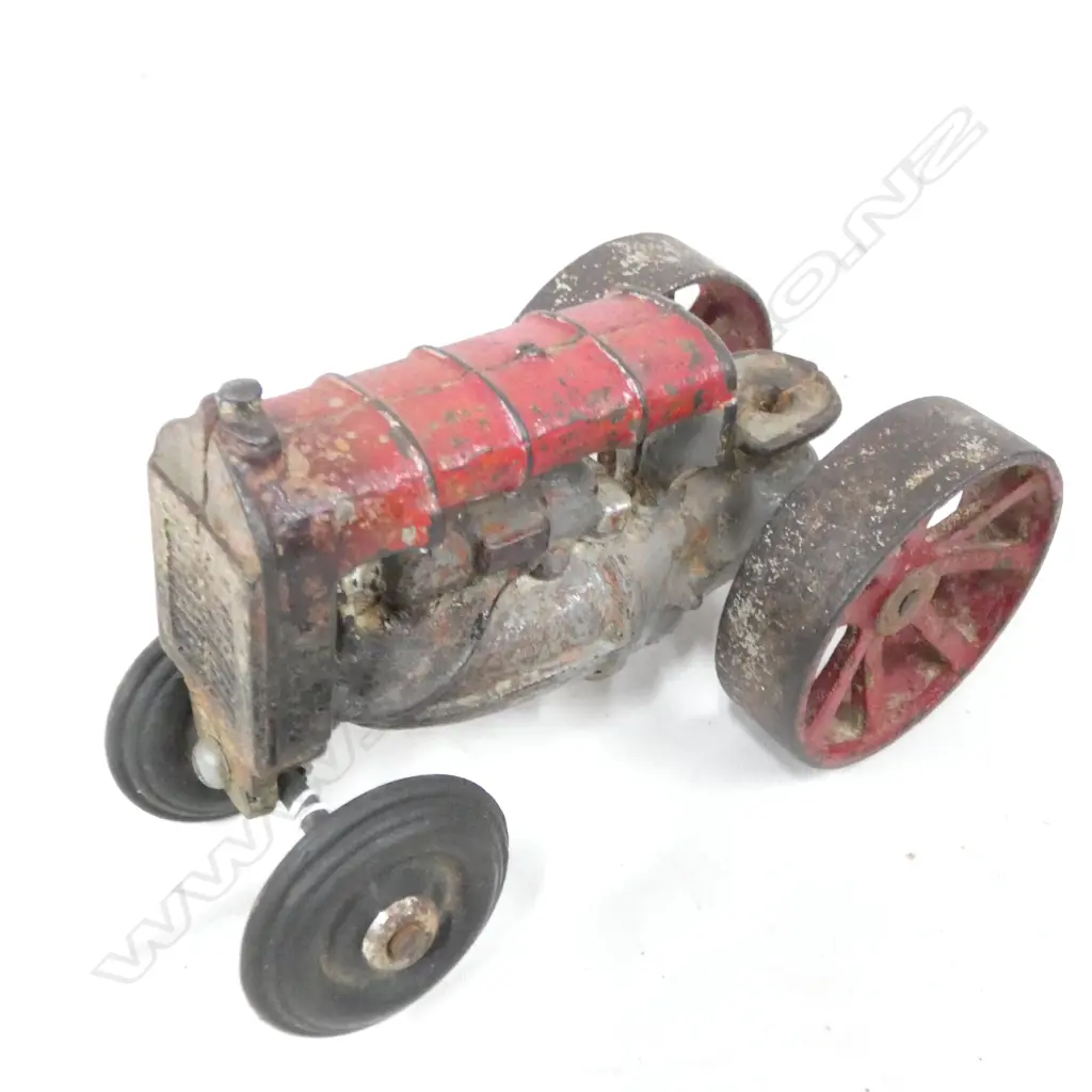 OLD CAST IRON TRACTOR  L 150MM - HAS WEAR TO PAINT Image 1++